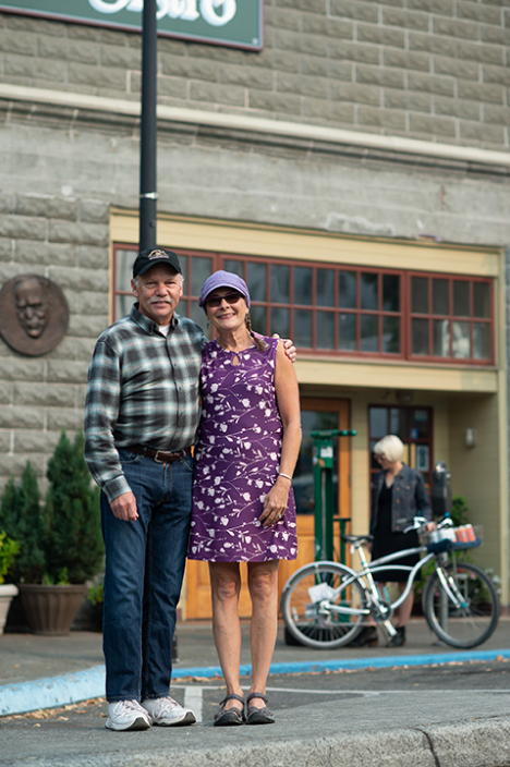 Two people standing on street
